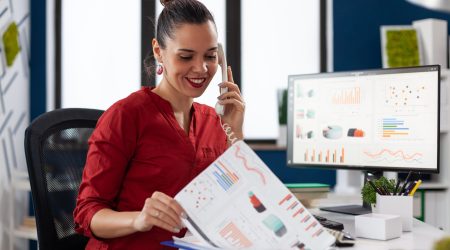 businesswoman-company-office-checking-finaicial-statistics